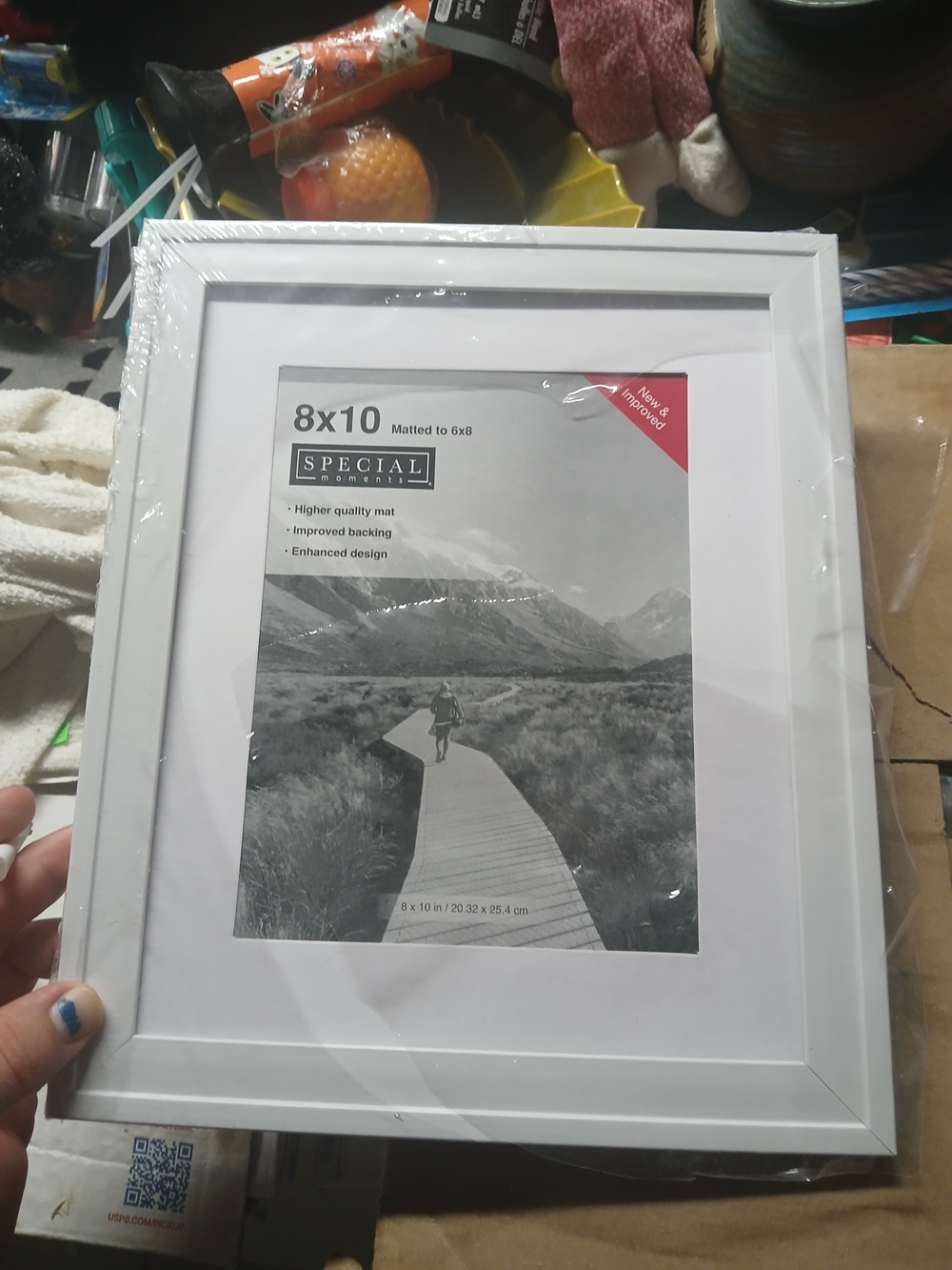white 8x10 picture frame by Special Moments that is matted to fit a 6x8 photo